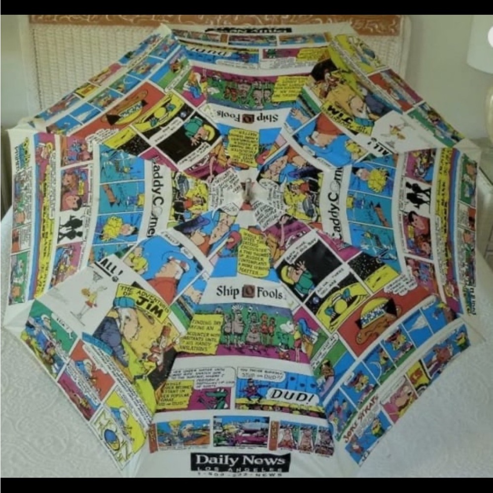 - Vintage daily news comic strip umbrella